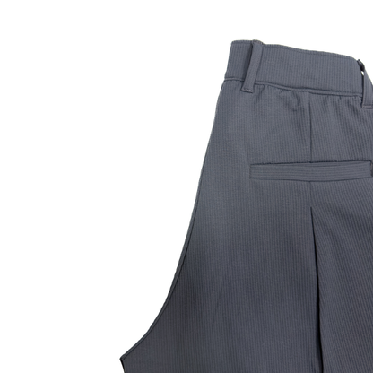 WIDE-LEG PLEATED TROUSERS
